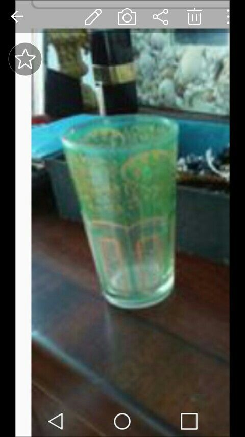 Green glass with gold