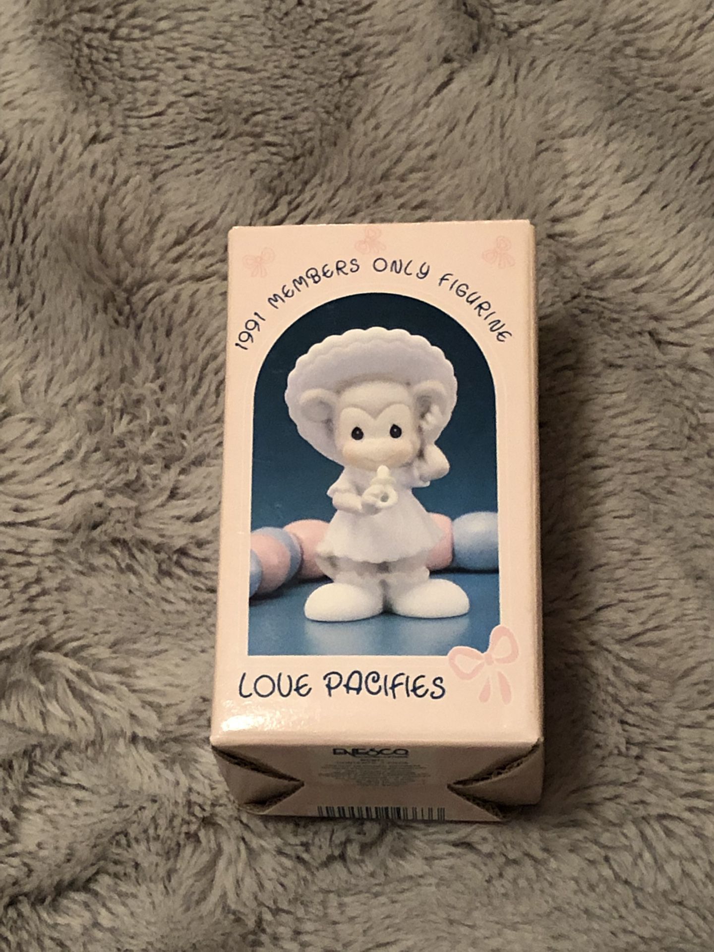 1991 “Love Pacifies” Precious Moments Collection Figurine