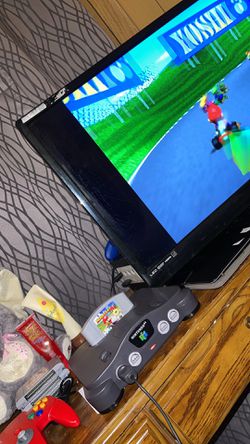 Nintendo 64 With 3 Controllers And 4 Games Thumbnail