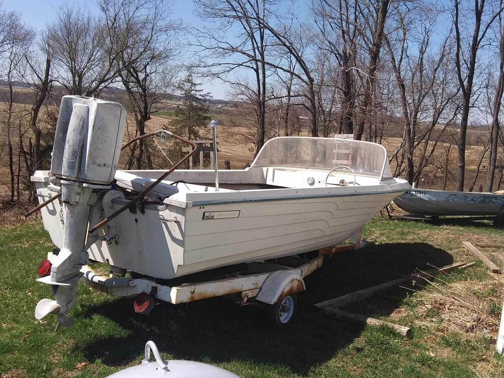 17 foot. 80 hp Sea King & trailer
