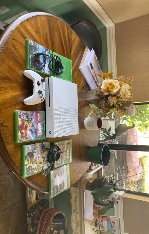 xbox one s am giving it out to bless someone who first wish me happy wedding anniversary on my cellphone number now 707^340^9916