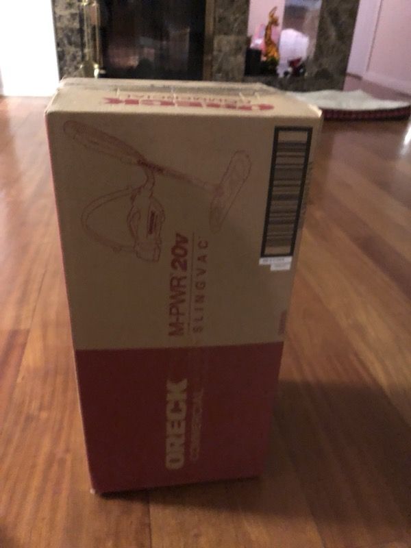 Brand new unopened oreck vacuum and dust cleaner