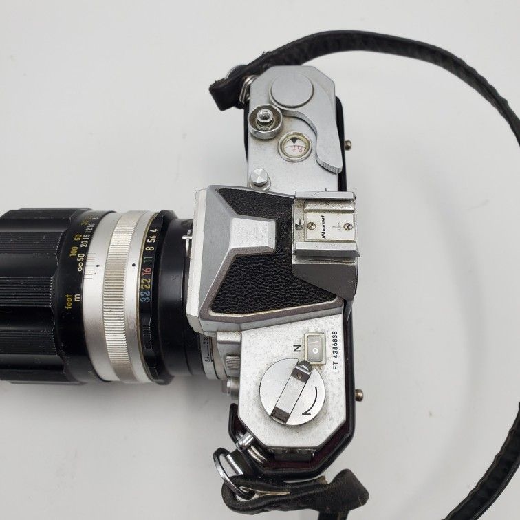 Nikon Nikkormat professional camera 35mm SLR W/ 200 MM Zoom Lens