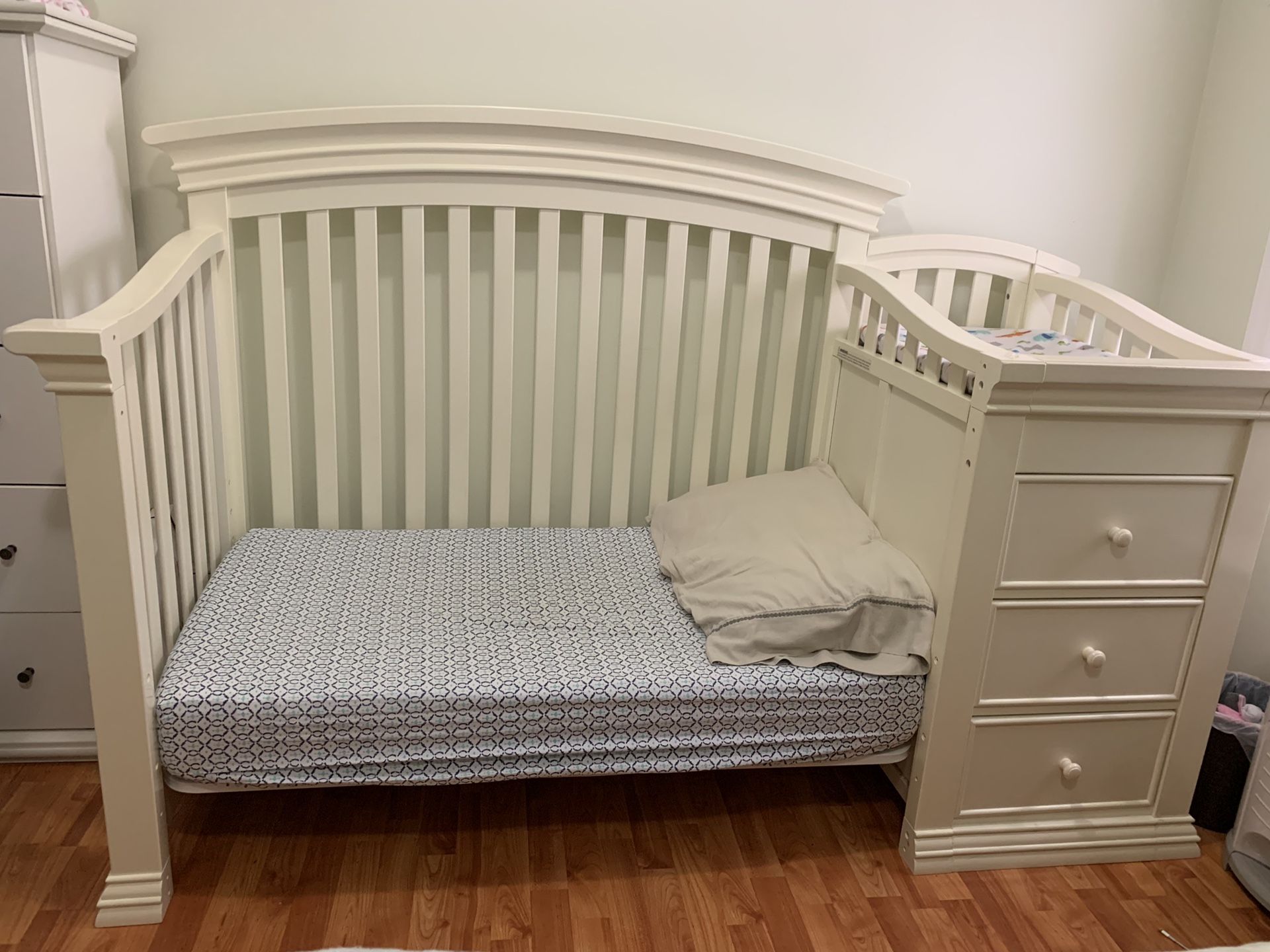 Solid wood Crib with changing table, mattress, and toddler railing for