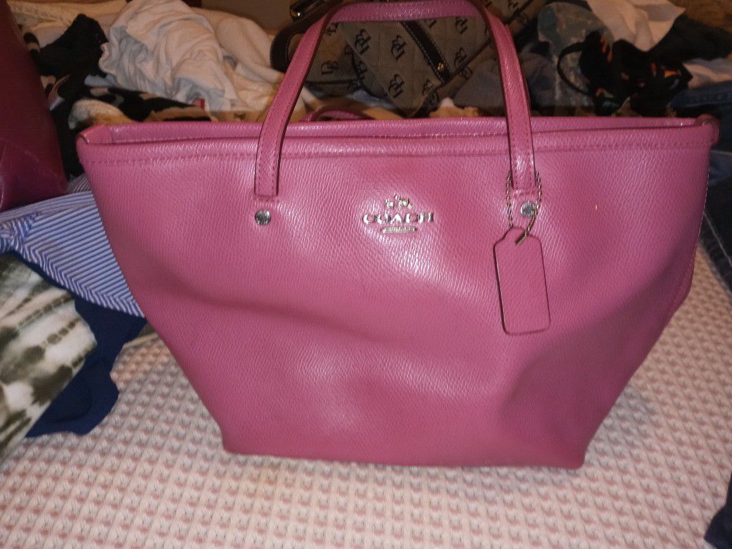 3 coach and one unknown brand purses for sale .
