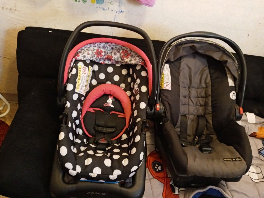 Minnie Mouse car seat $45 and black and grey car seat is $25