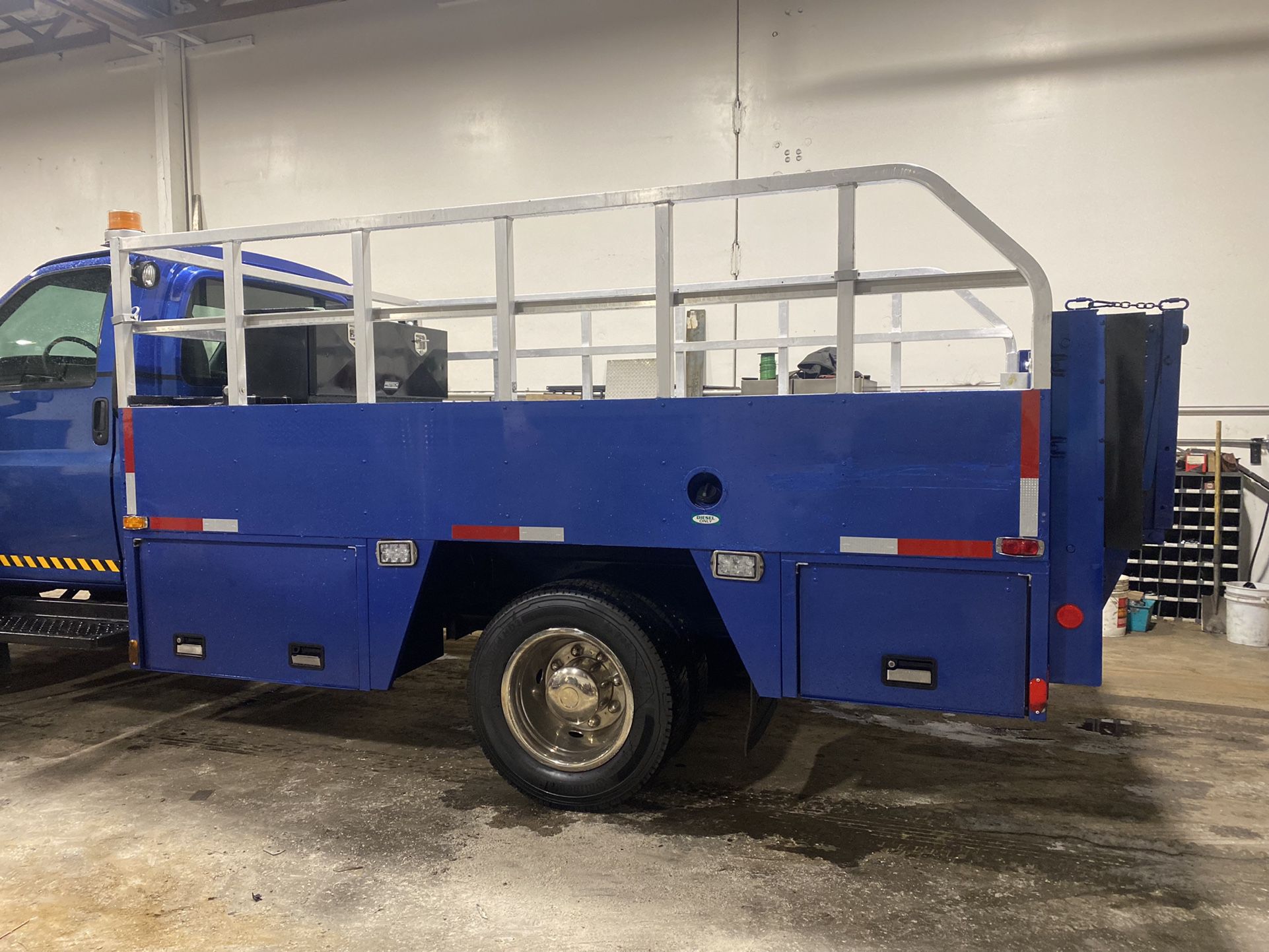 Flatbed with liftgate and toolboxes 