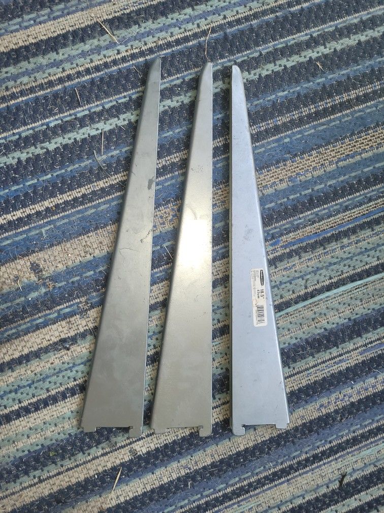 Three Rubbermaid 18.5 Shelf Brackets