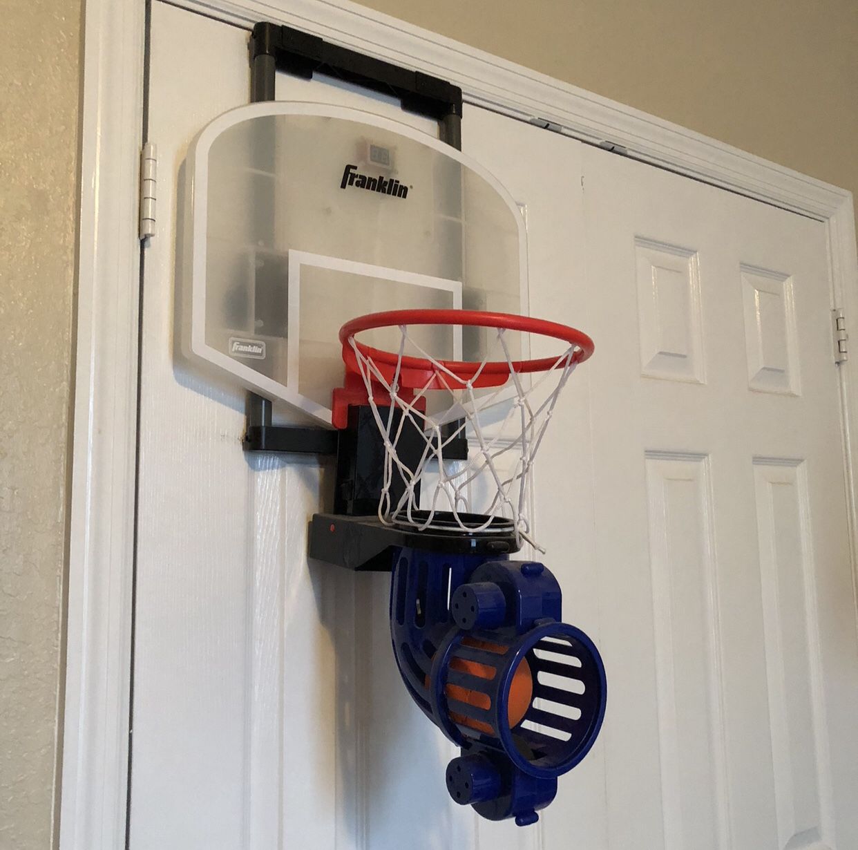Franklin Sports Mini Basketball Hoop with Rebounder and Ball - Over The Door Basketball Hoop With Automatic Ball Rebounder - Indoor For Kids