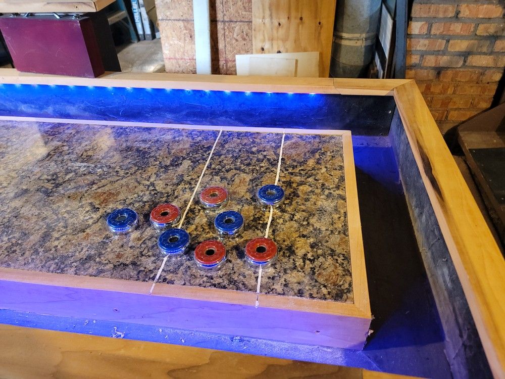 Shuffle board table