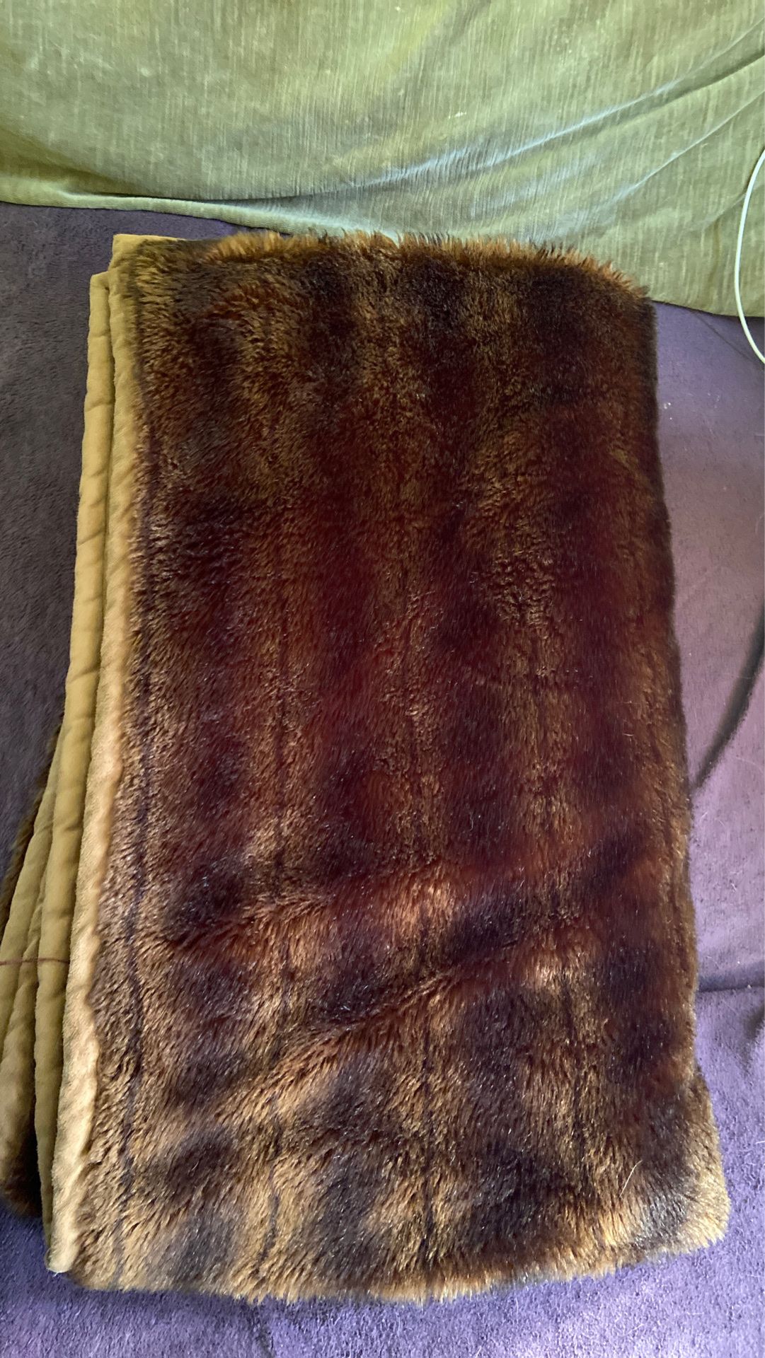 Soft synthetic brown fur blanket