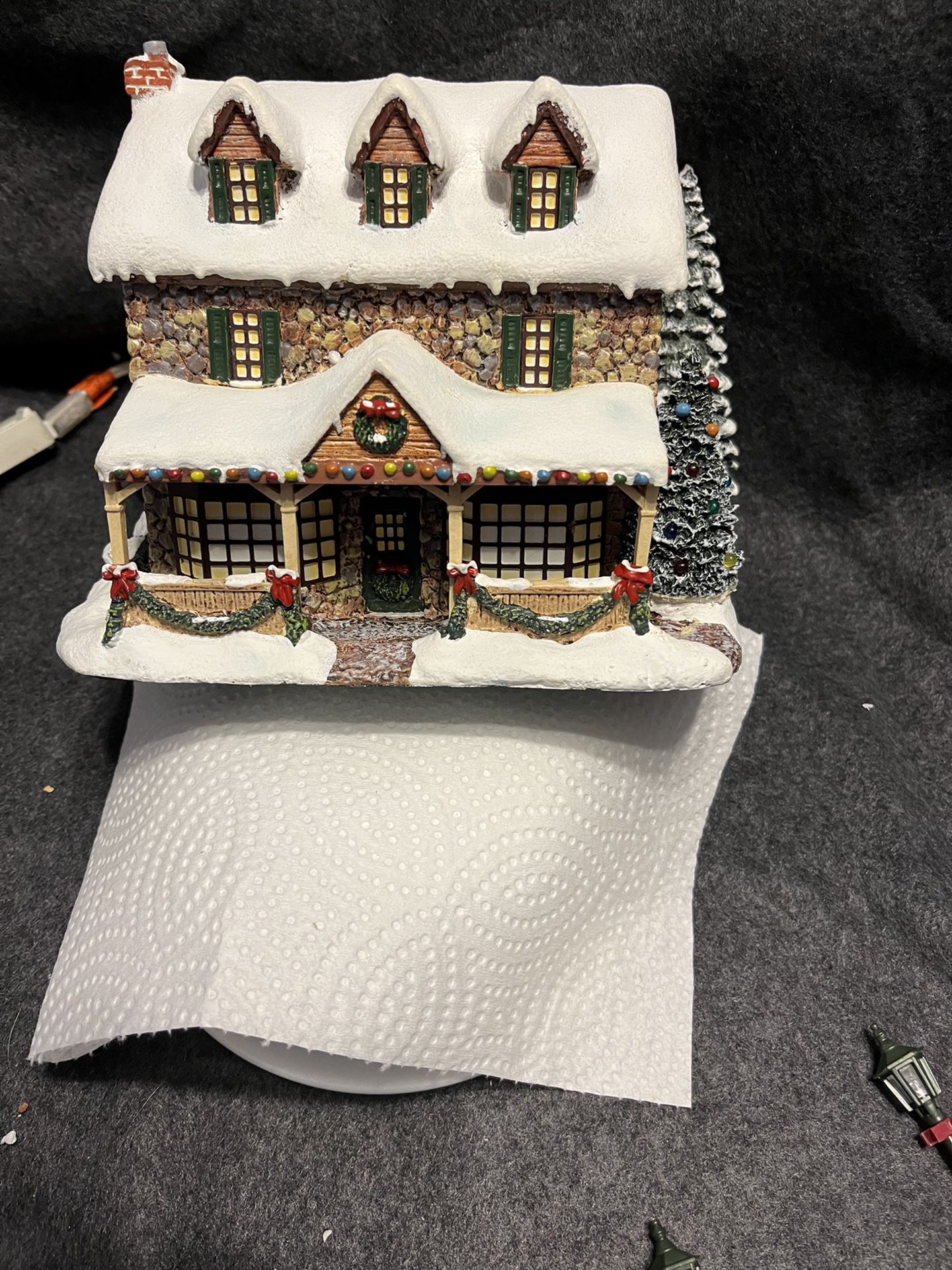 7  “Thomas Kinkade ‘s “ Village Christmas Collection , Each Come with cord that allows them to light up with switch