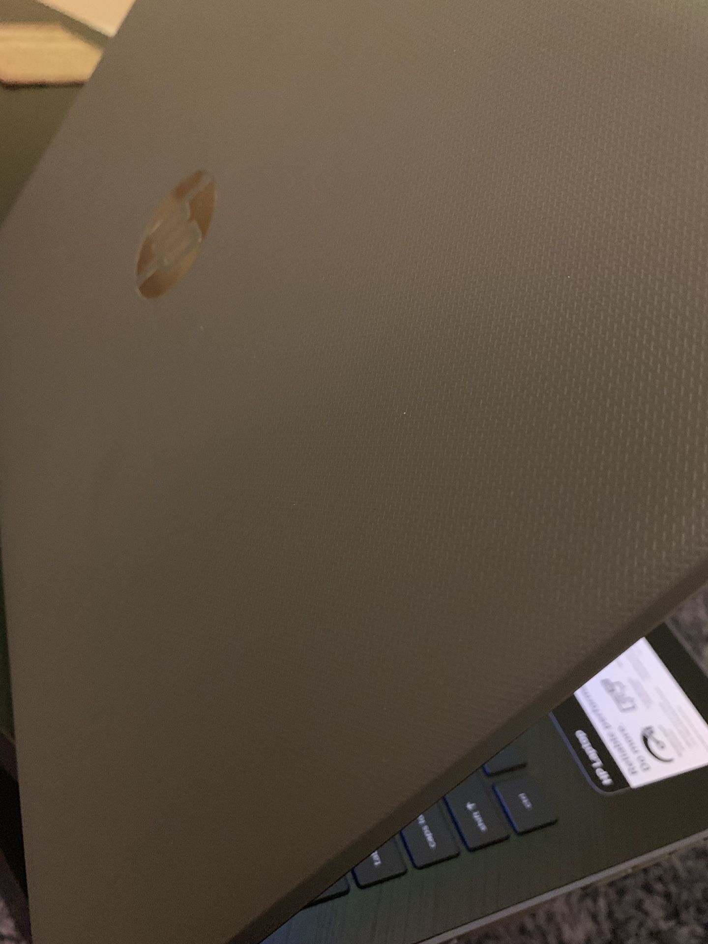 HP laptop with backpack and mice