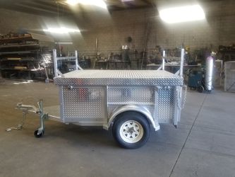 6x4 Foot Custom Silver Camping Trailer With Diamond Plate Aluminum And All LEDlights Thumbnail