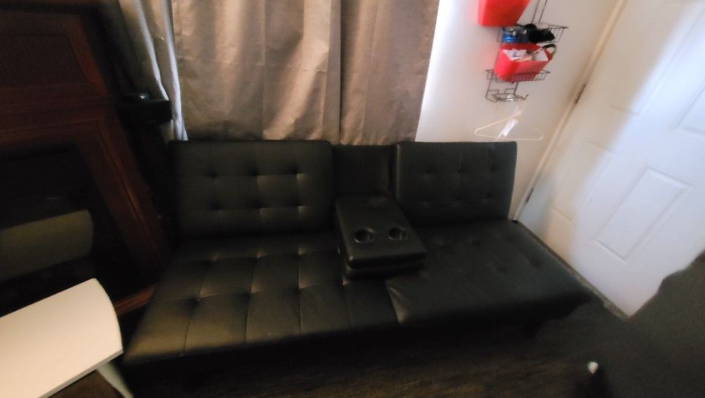 Pleather Futon Has A Small Slice The Back But I But A Peace Of Black Tap And It's Hardly Noticeable