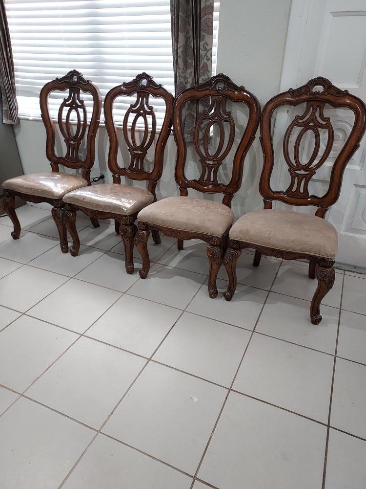 4 chair and some part of the wood is a bit beaten but still good firm price