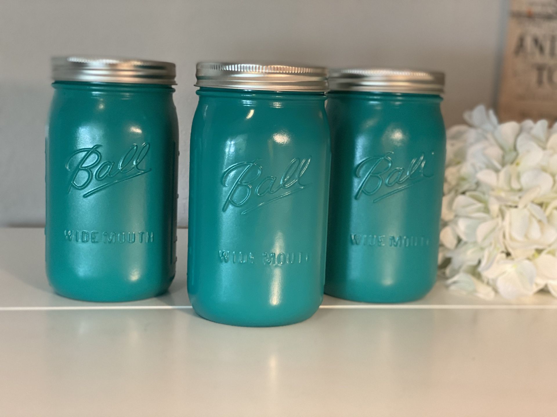 Set of three hand painted mason jars