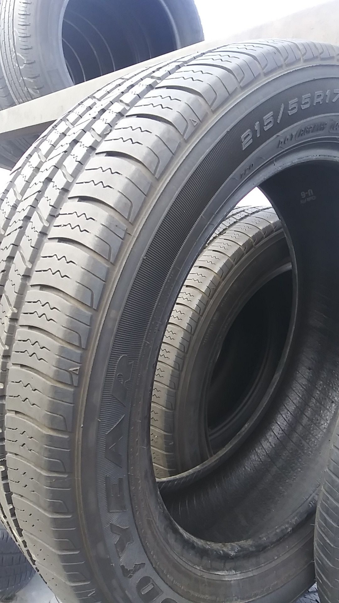 Pair of Goodyear tires size 215/55/17