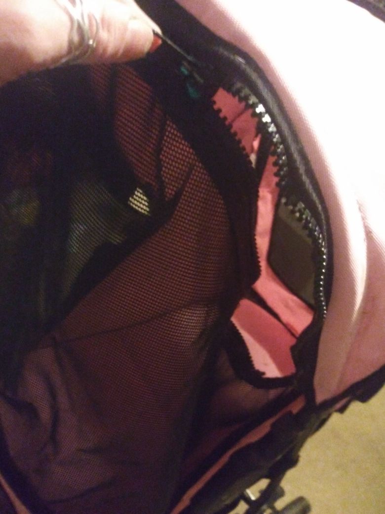 PINK DOG ANIMAL STROLLER (LOTS OF STORAGE UNDER STROLLER & DRINK CARRIER ON TOP)