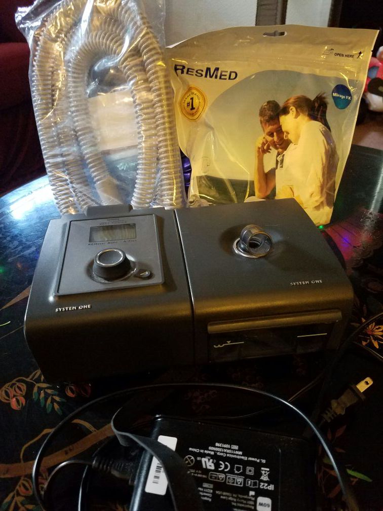 Respironics System One Auto CPAP and Humidifier (Sleep apnea machine) With new mask and new hose and a carrying case