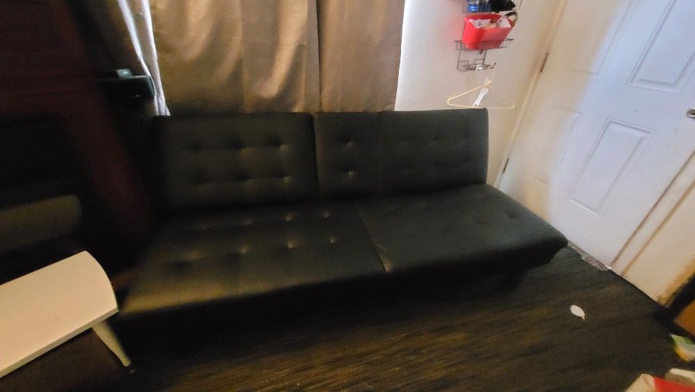Pleather Futon Has A Small Slice The Back But I But A Peace Of Black Tap And It's Hardly Noticeable