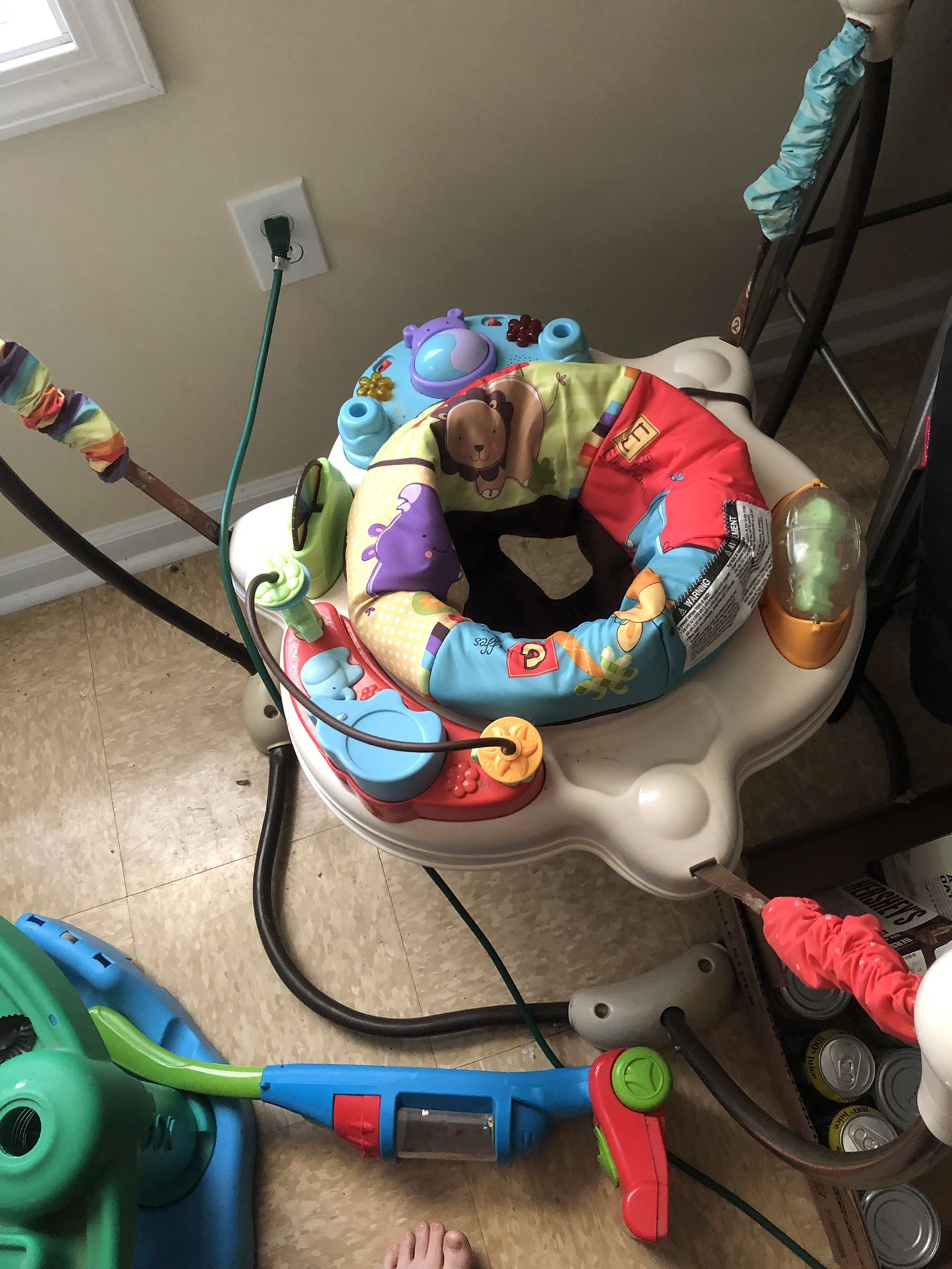 Baby bed, mattress, bouncer, activity seat , 3 bags of baby cloths car seat and excersor