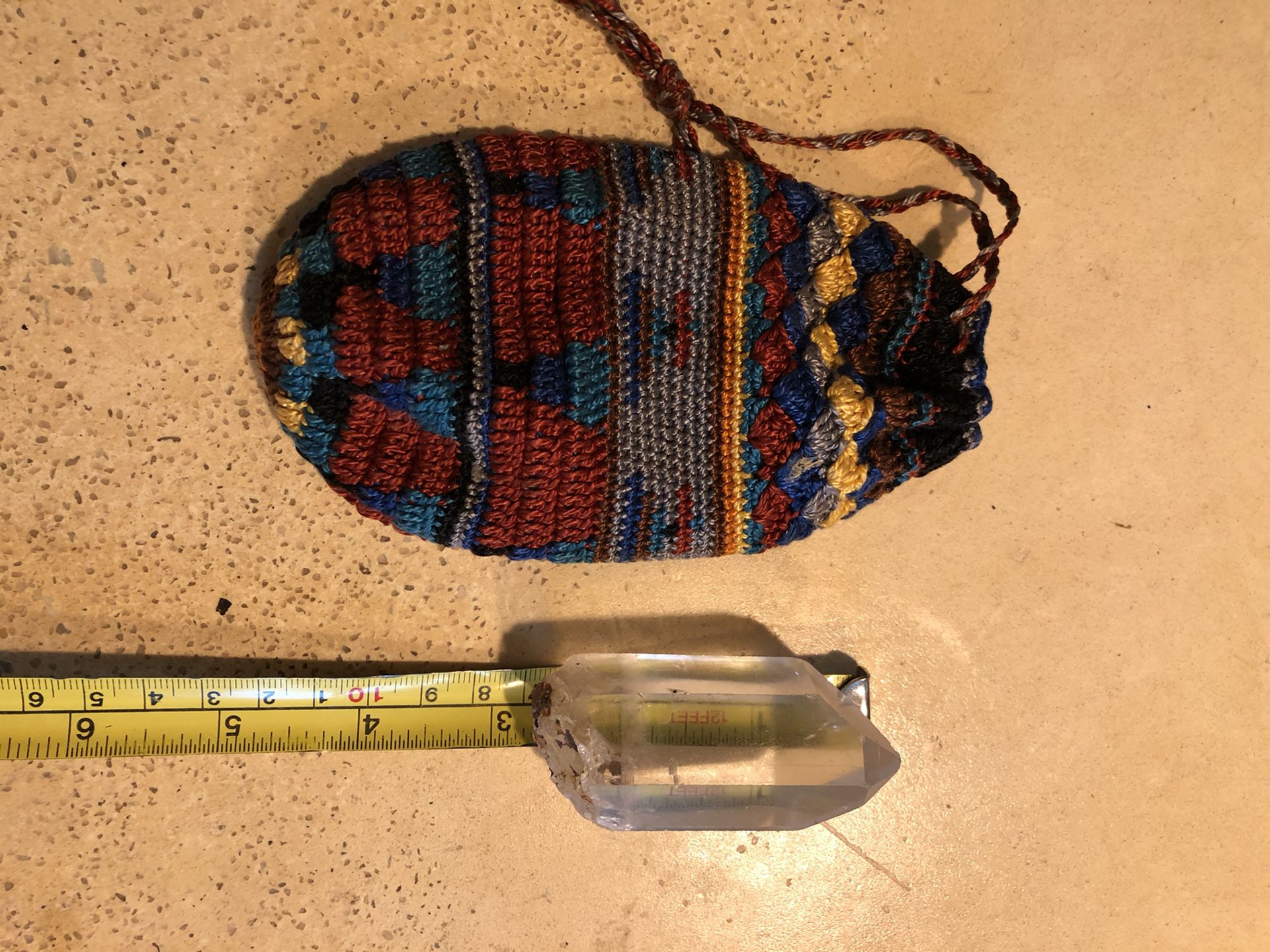 High energy quarts crystal with handmade bead bag
