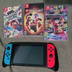 Nintendo Switch With Wireless Mario Controller And 3 Games Thumbnail