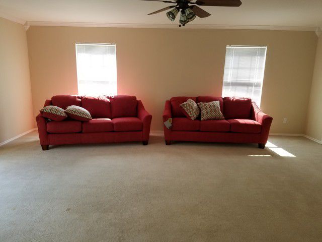 Two Couches - Red Cloth w/pillows