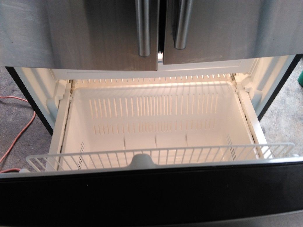 LG 3 door refrigerator stainless steel works good