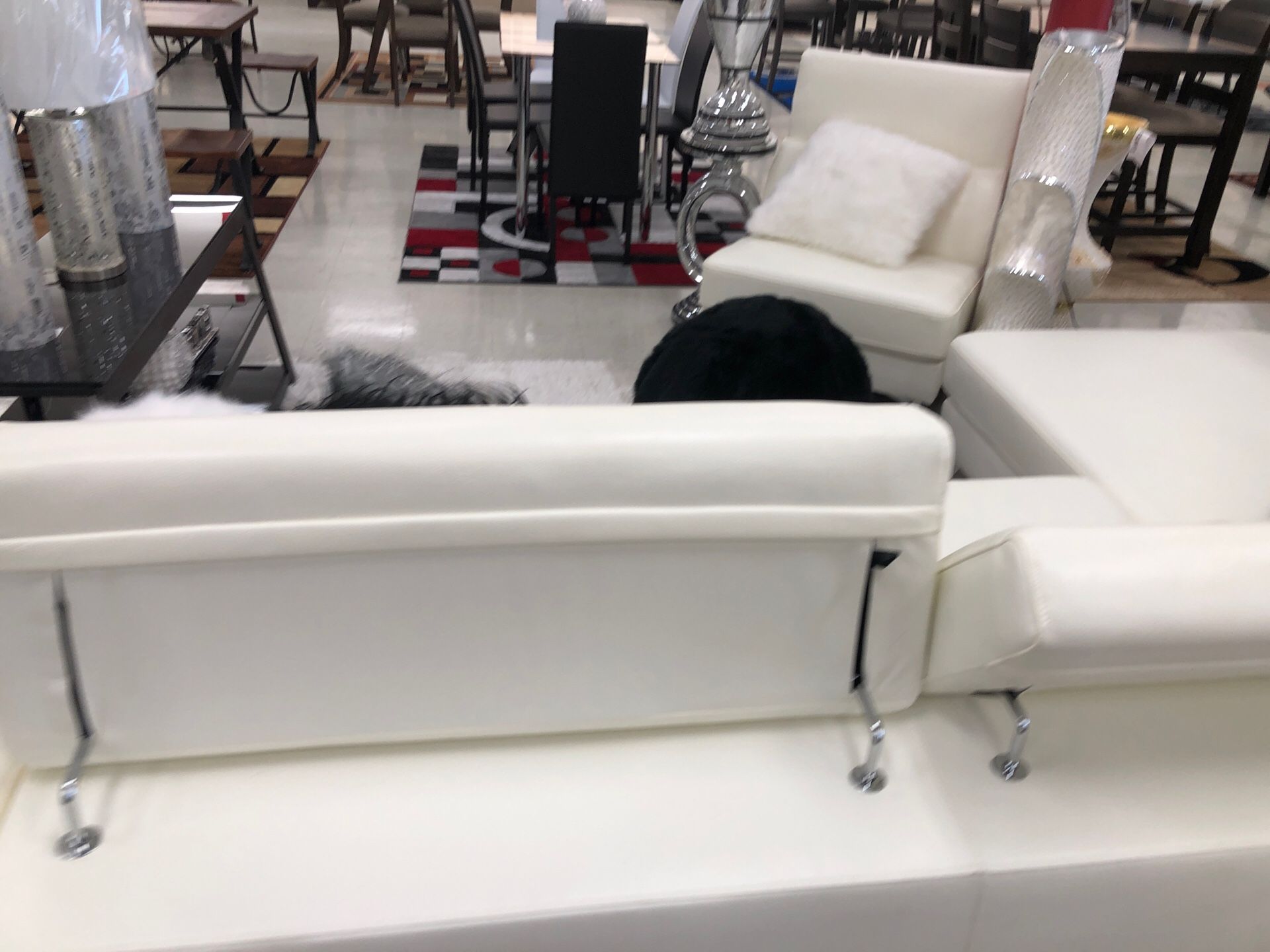 White sectional with adjustable headrest
