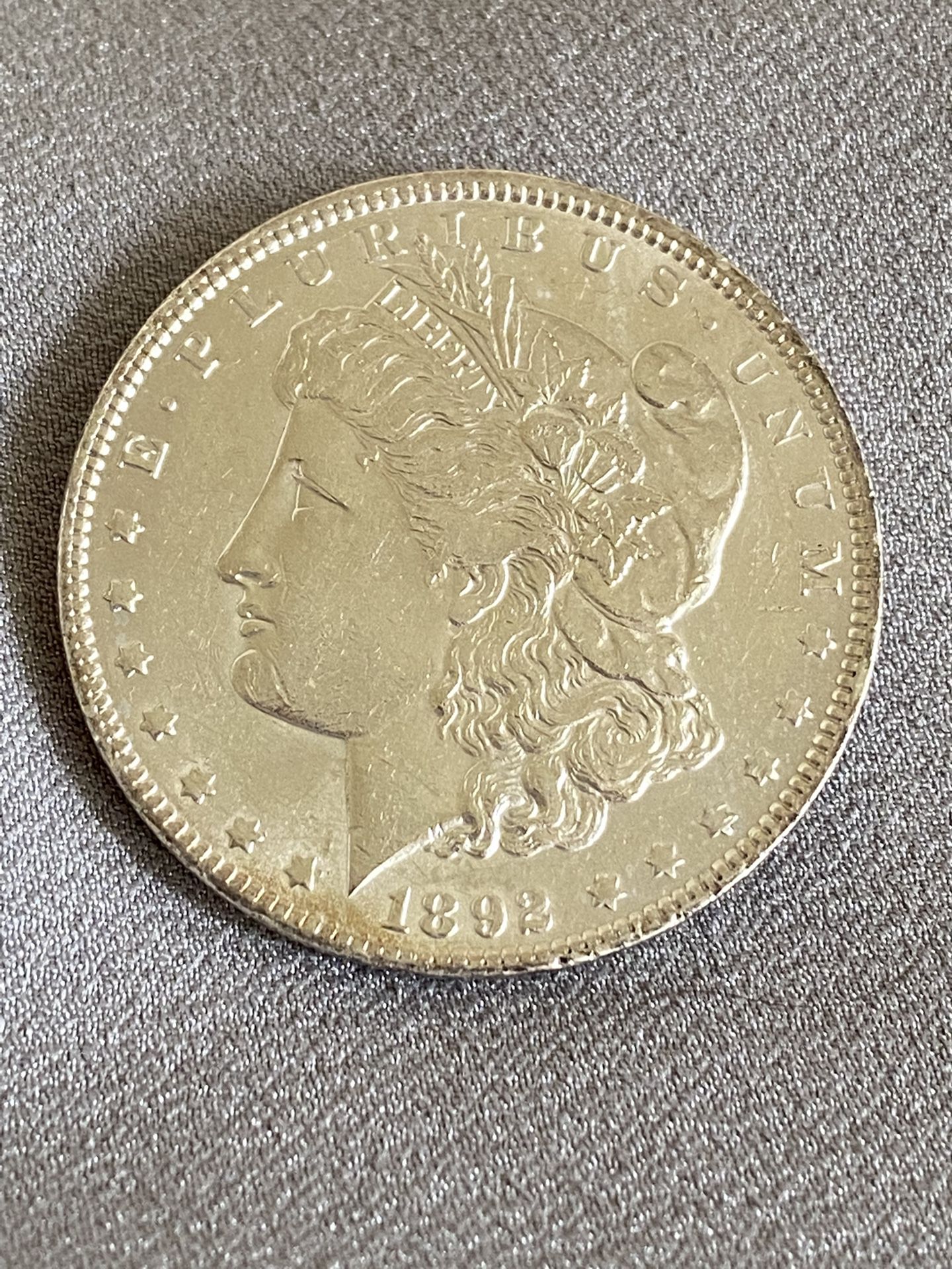 1892 p Morgan Silver Dollar. CLEANED. Better Date Higher Grade. 