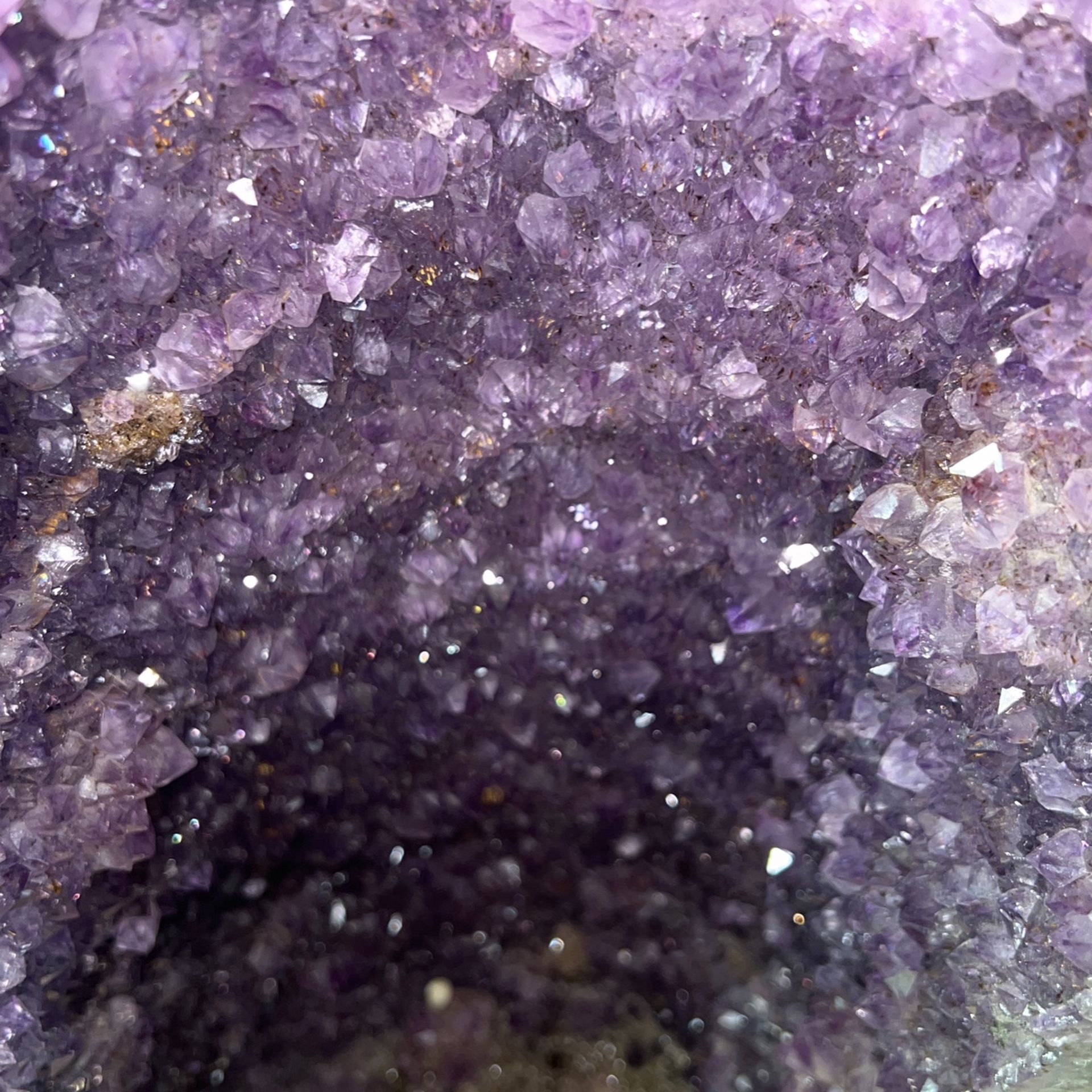Set of two purple amethyst crystal geodes