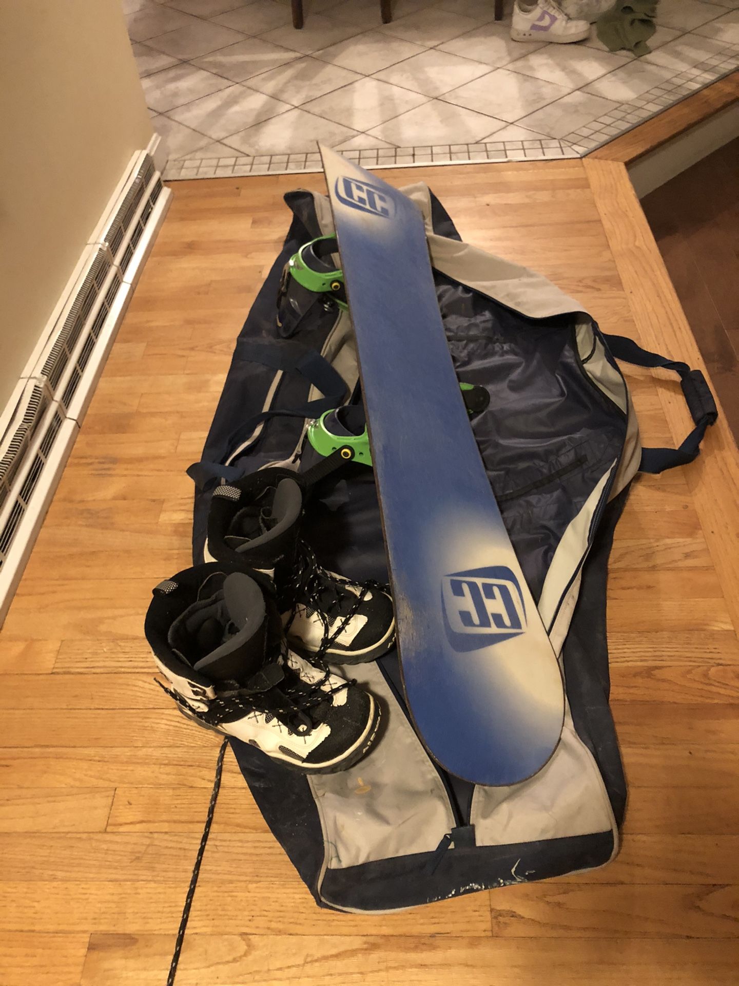 Snowboard with boots and bag