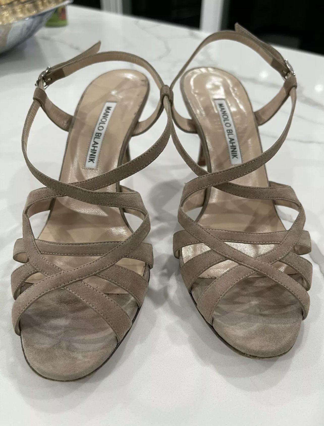 Manolo Blahnik 37.5 pre owned. Round toe. Lace up closure. Ankle strap with adjustable buckle. Leather lining and sole. With a 70mm (2 3/4”) heel. Ma