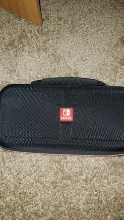 Nintendo switch games and brand new protection pack. Used Nintendo brand carrying case in good condition. Thumbnail
