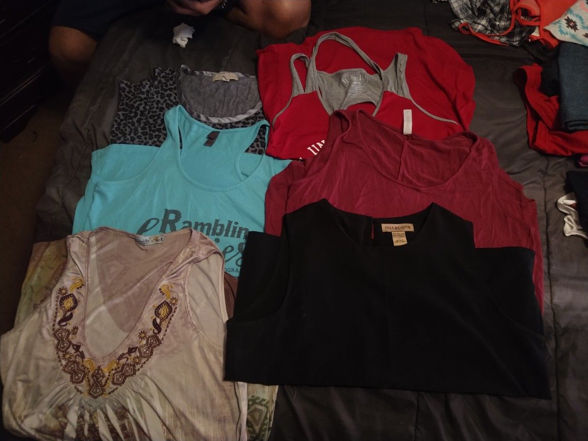 Only a few of many in a big people tub. Some large, medium, size 12-16 pants, jackets, and hooded shirts, night gowns,dresses