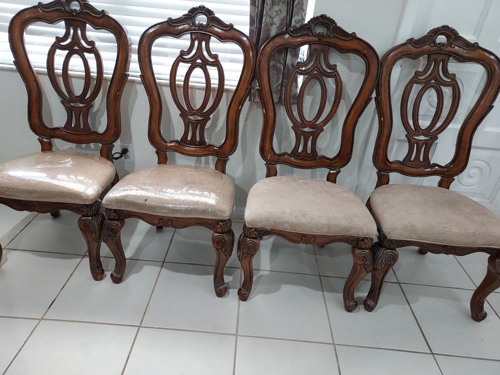 4 chair and some part of the wood is a bit beaten but still good firm price