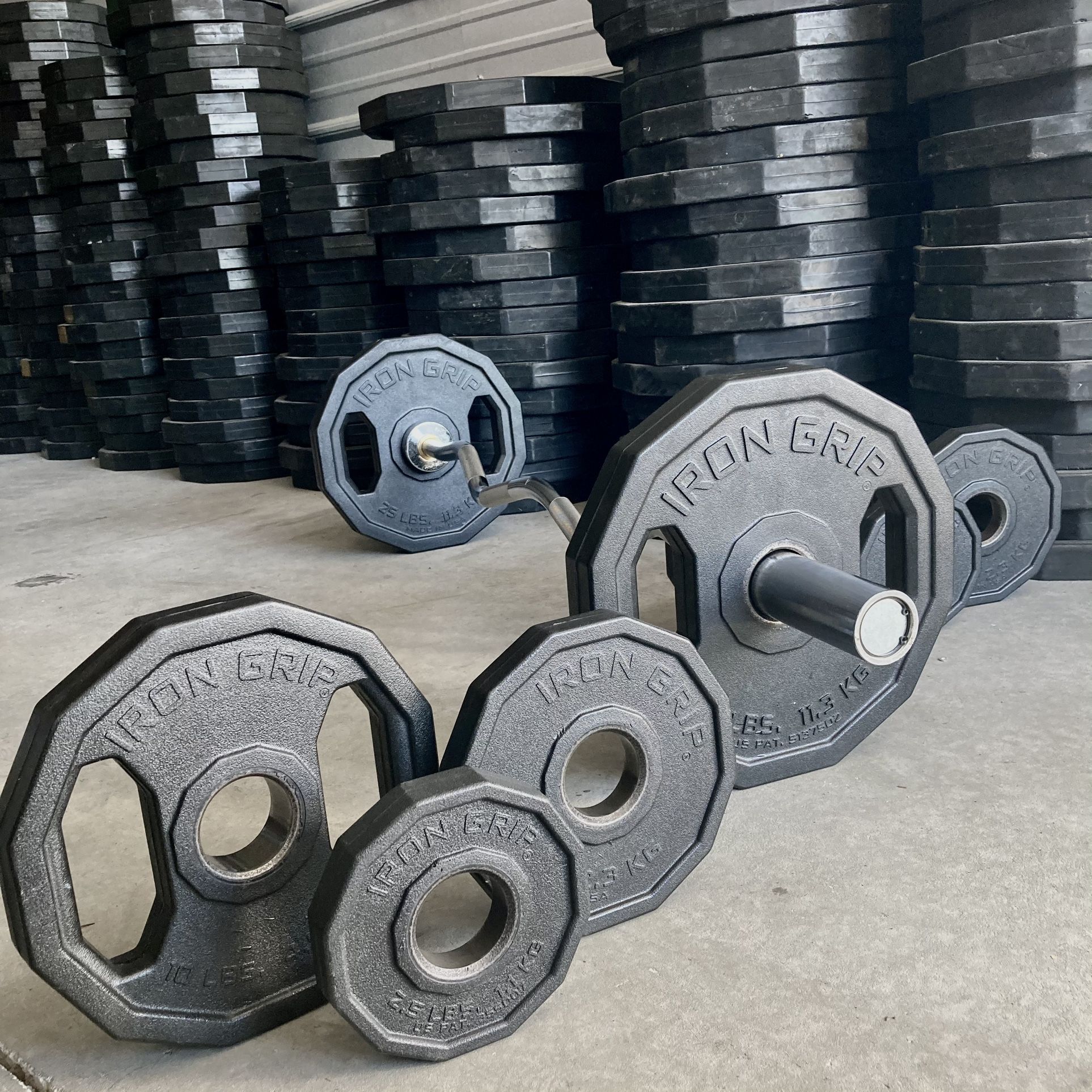 Weight Set- Olympic Bar, EZ Curl Bar, 45s, 25s & 2” Clips