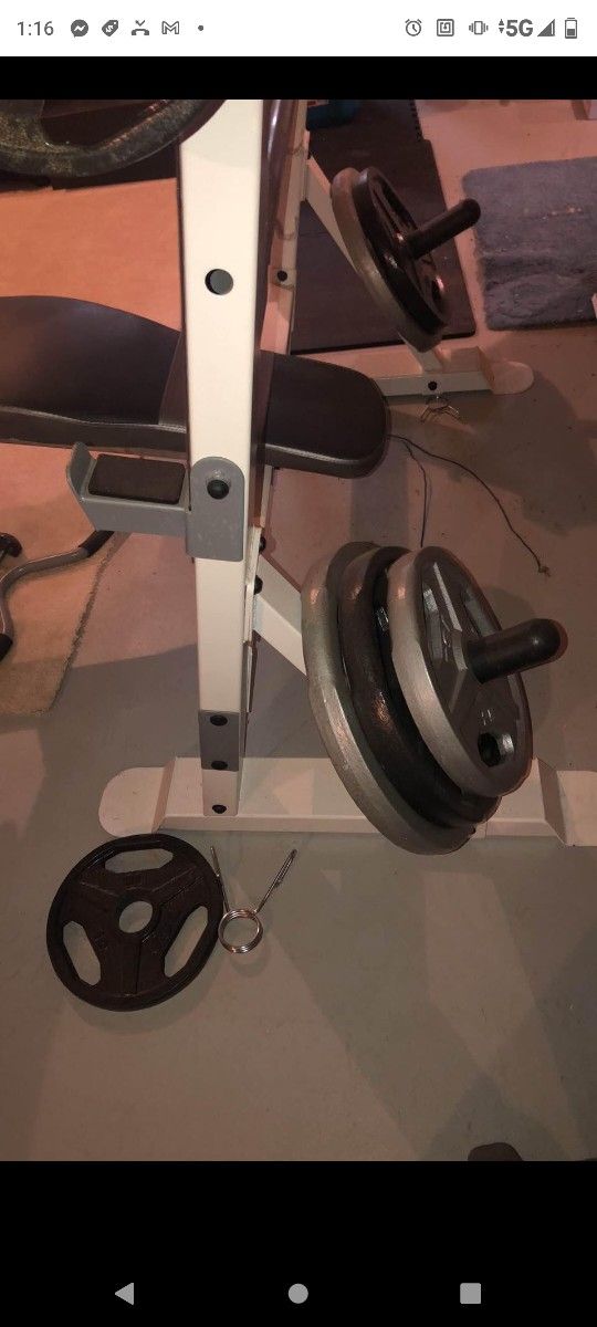 POWERHOUSE WEIGHT BENCH WITH 300 LB OLYMPIC WEIGHT SET ( LIKE NEW & DELIVERY AVAILABLE TODAY)