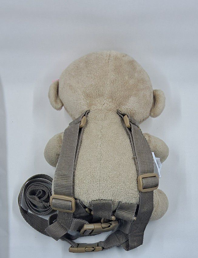 (REDUCED) CARTER'S "CHILD OF MINE" MONKEY GIRL W/ PINK BOW & POUCH ON HER TUMMY /HARNESS