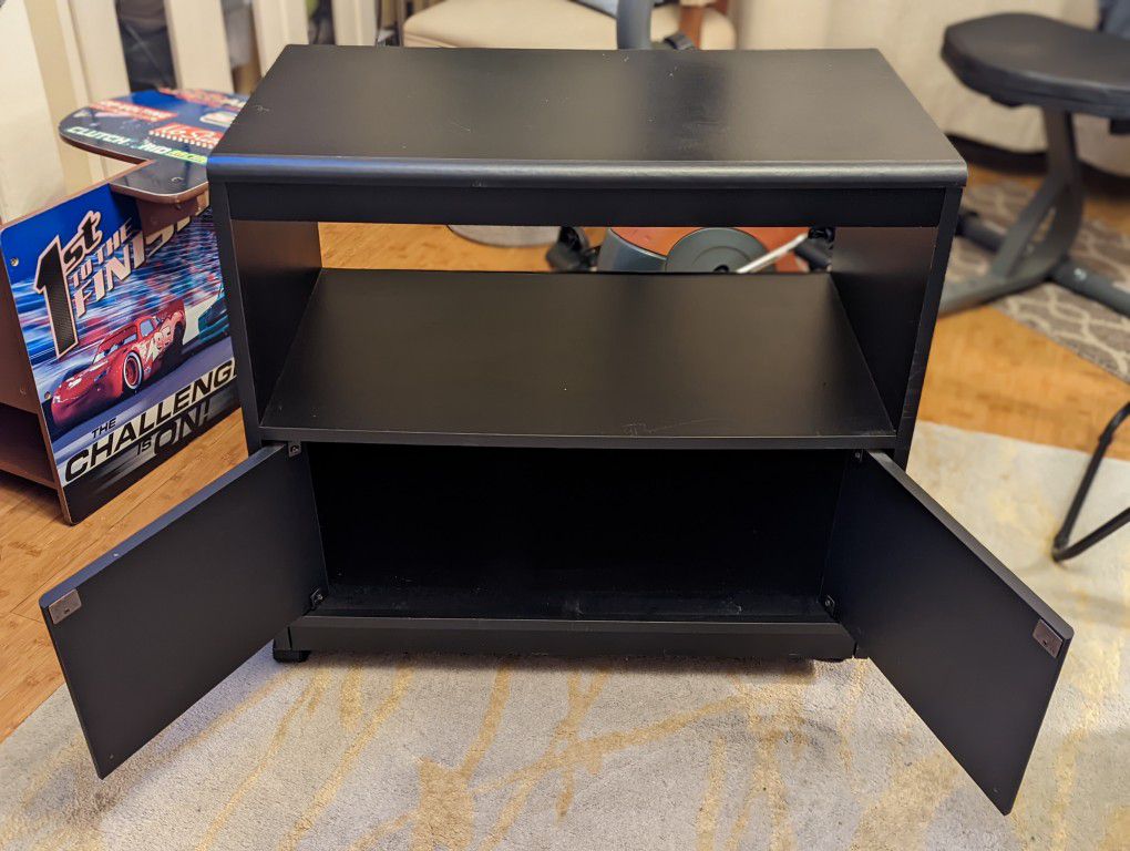 Small Black Entertainment Center With Shelf In Lower Cabinet