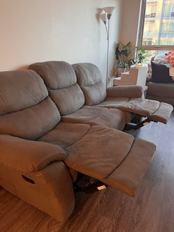 Two Piece Grey Reclining Couches Thumbnail