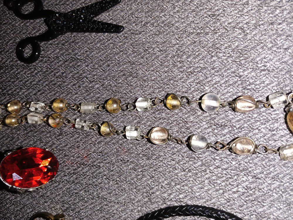 3 Necklaces, 4 Bracelets, And 3 Anklets