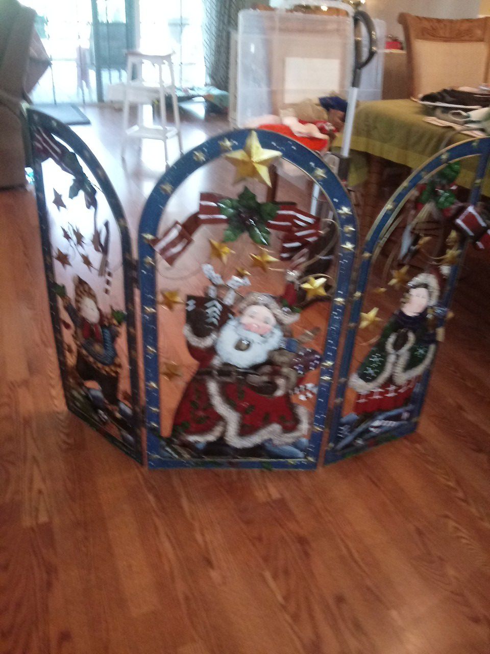 Metal christmas decor devided in 3 sections great for in front of fire place near tree or in patio 2 sides fold for standing or even wall 15.00