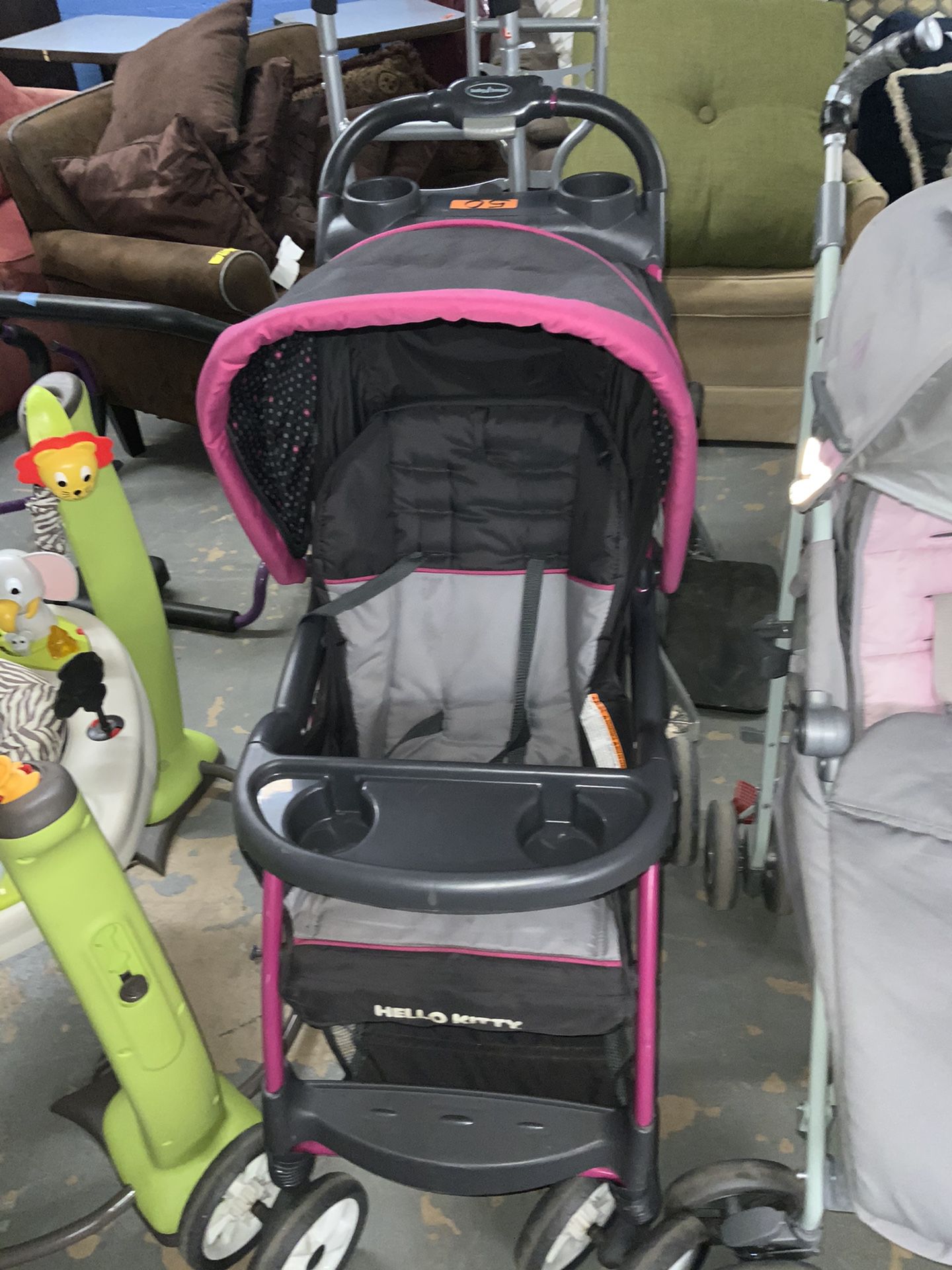 Pink And Black Hello Kitty Stroller