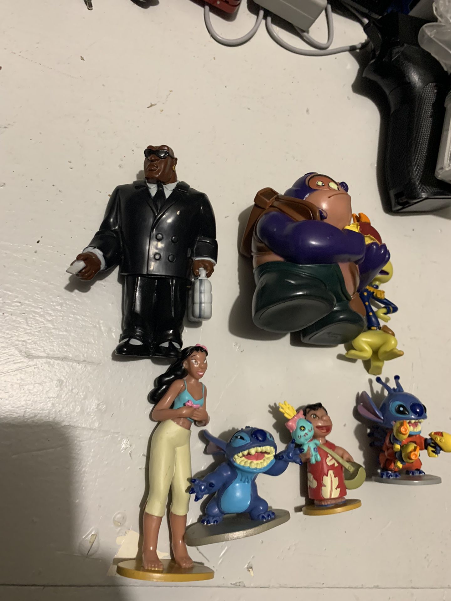 classic Lilo and Stitch figure set from Disney store rare Minor wear and tear but all around in great condition.