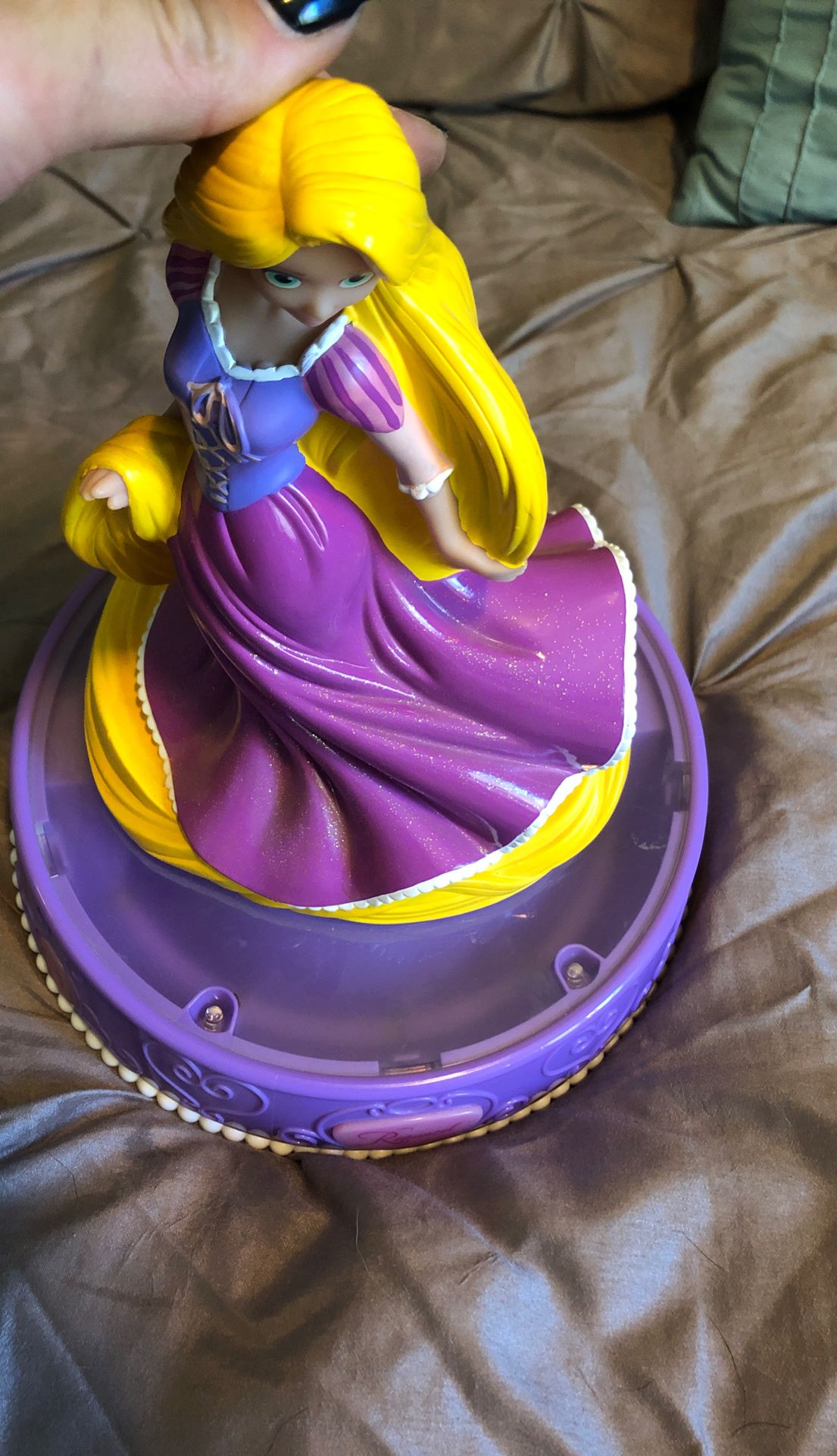 Rapunzel singing piggy bank