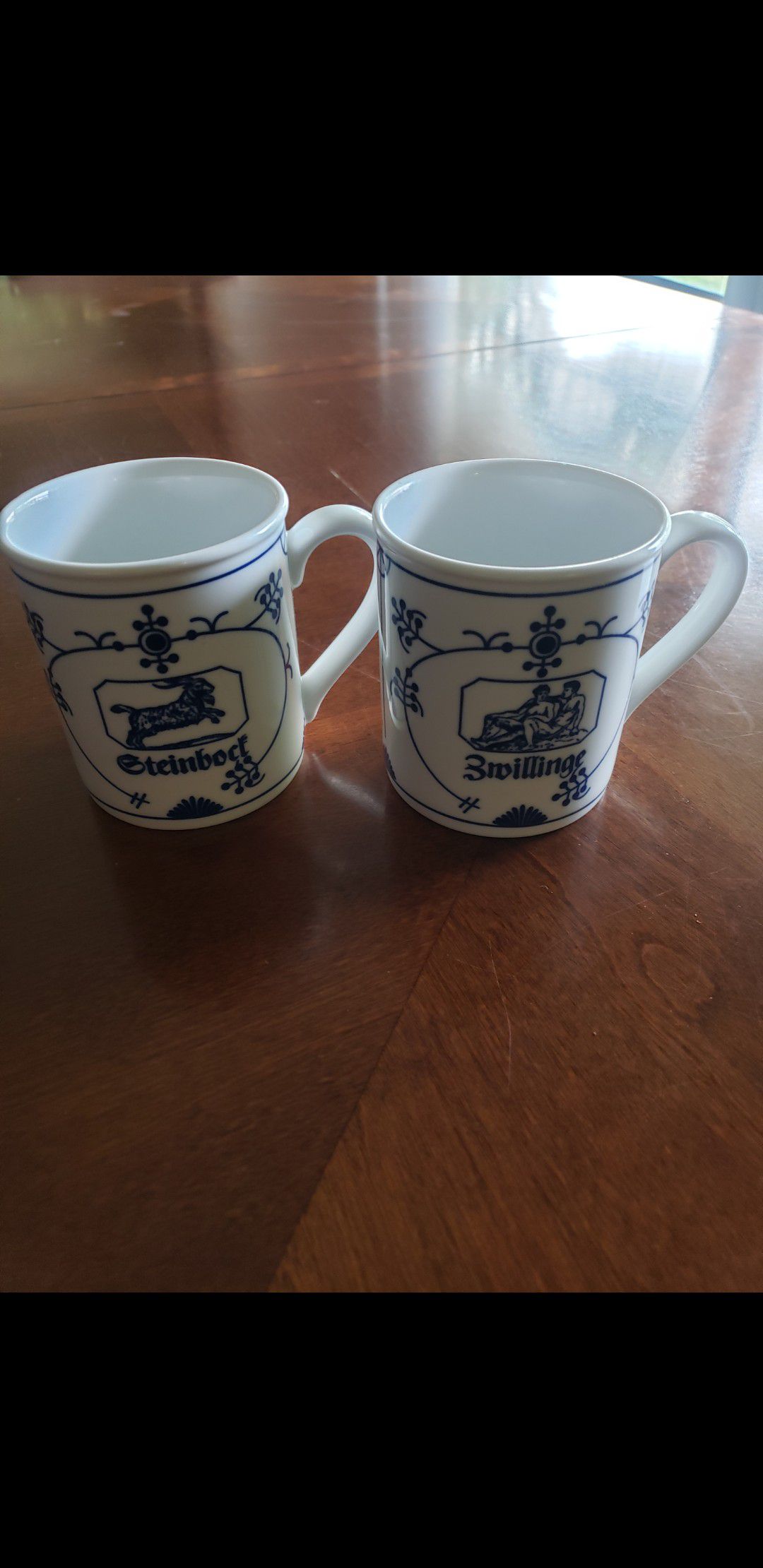 Pair German UNTERGLASUR SPULMASCHINENFEST blue and white tea mugs Cups.