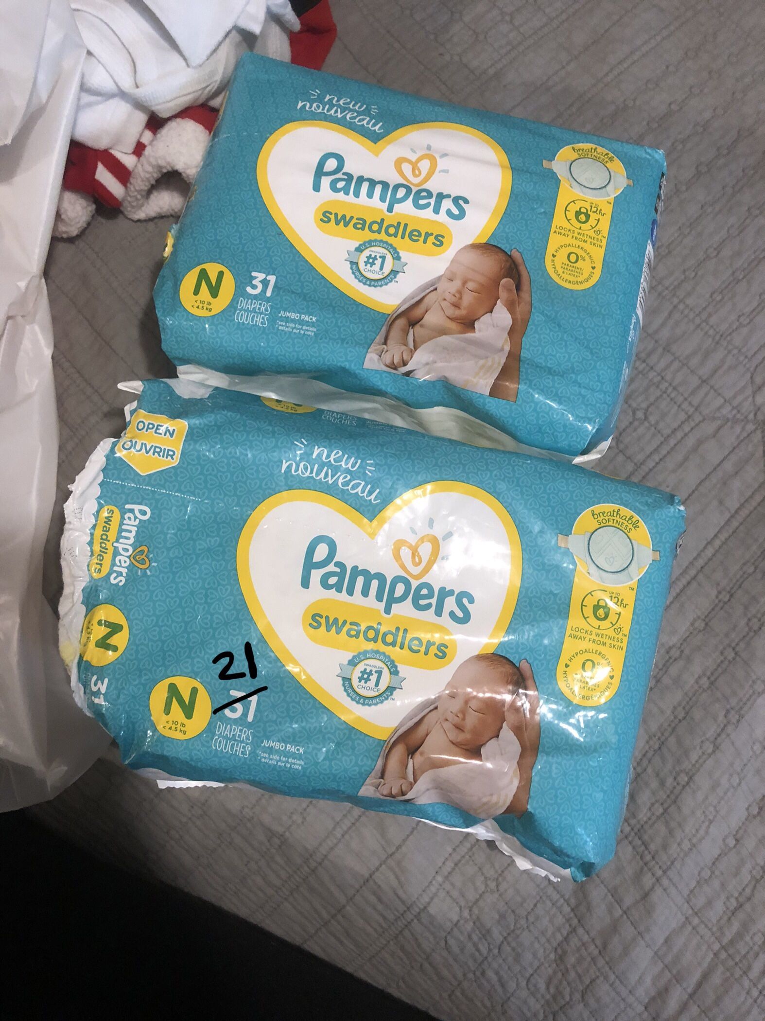 Newborn Sized Clothing And Diapers